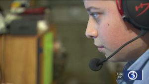 Boy playing computer game