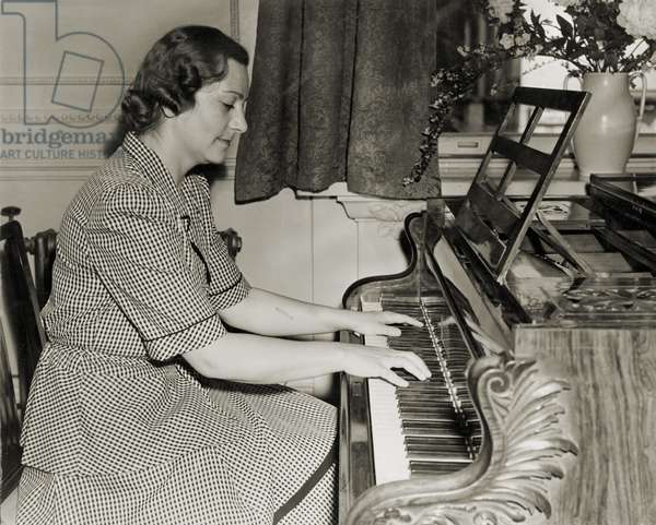 3772295 Natalia Karp ( Weissman; (add.info.: Natalia Karp ( Weissman ) playing piano at Polish Embassy, London 23 June 1949. Chopin played same Broadwood piano in London, June 1848. Born 27 February, 1911-2007. Survived Plaszow &amp; Auschwitz concentration camps-her &amp; her sister's lives were saved as she was a concert pianist-her story in film Schindler's List. Courtesy of Natalia Karp); Lebrecht Music Arts;  it is possible that some works by this artist may be protected by third party rights in some territories.